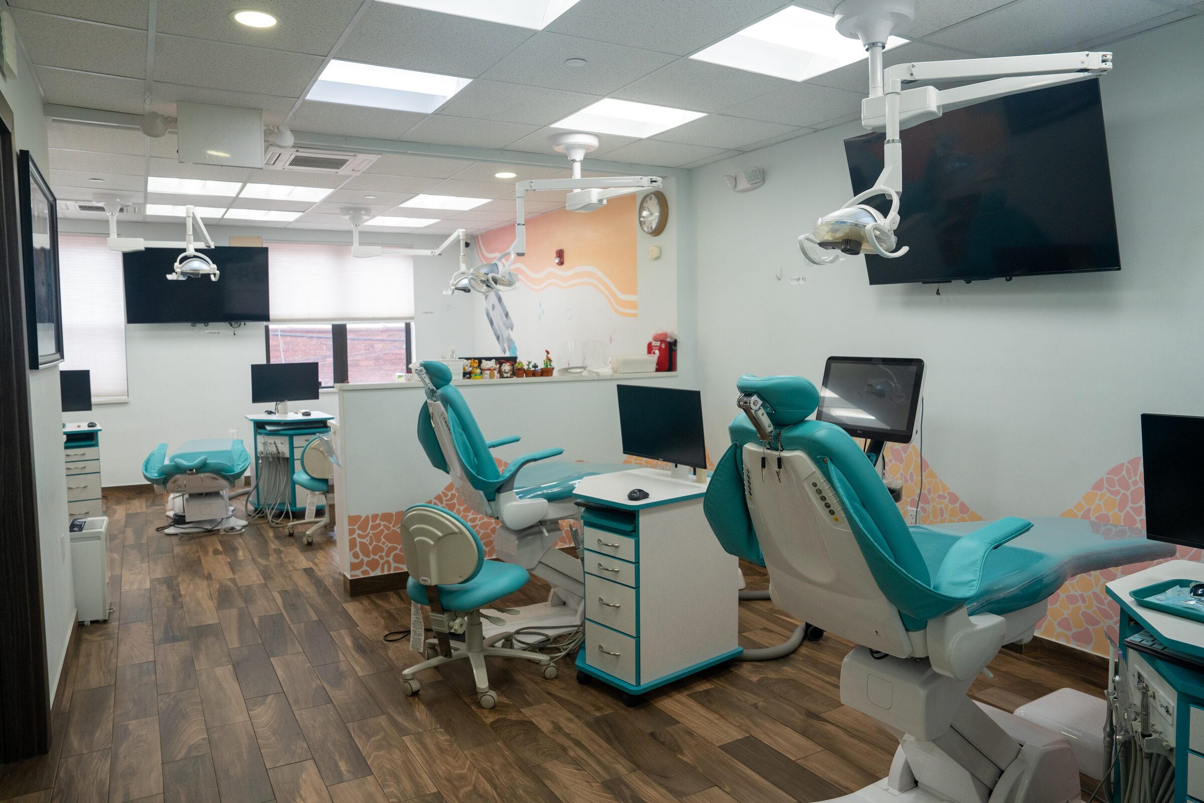 The open treatment bay at the Straight Finish Orthodontics office in Brooklyn