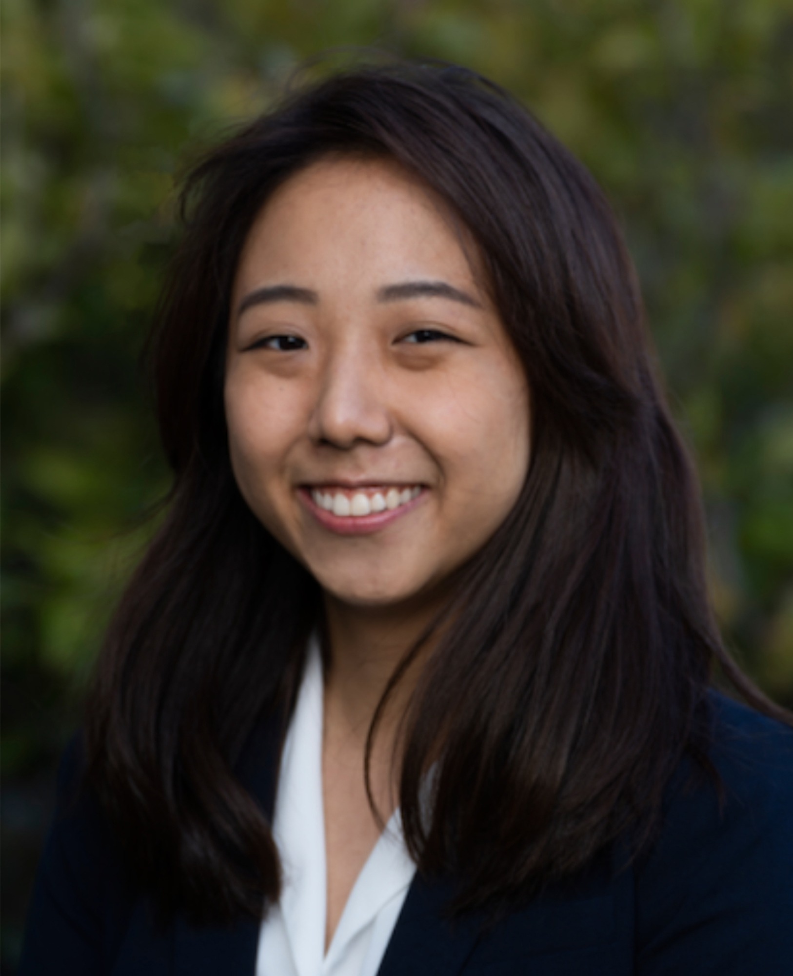 Dr. Grace Chung, DDS, smiling, photographed outdoors